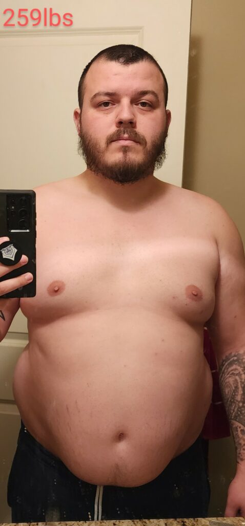 profile photo of a shirtless man from the waist up.